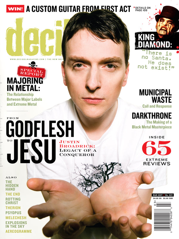 Magazine cover featuring a person with outstretched hands, with text about music bands Godflesh and Jesu and reviews.