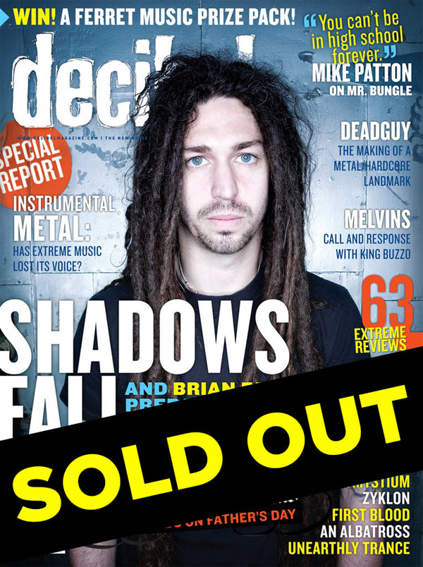 Magazine cover of Decibel featuring a man with a microphone and the text 'Shadows Fall' and 'Brian Fair' along with the issue number '021'.