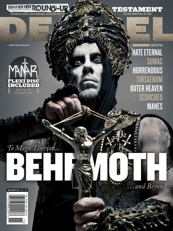 Decibel Magazine cover featuring Nergal of Behemoth with intricate headgear and a crossbow, with text and branding elements.