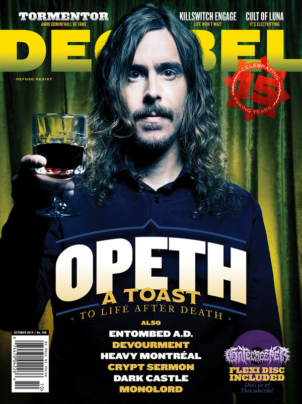 Magazine cover featuring a person holding a glass with text about Opeth and other bands.